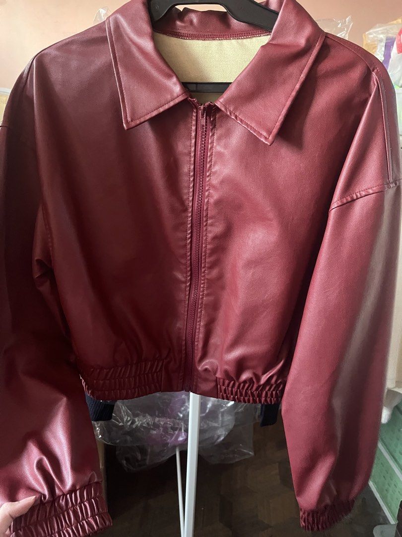 SHEIN red faux leather jacket (Category: Coats, Jackets and Outerwear) located in Manila. Submitted by justshop.ph (Listing ID 1465546728, Image 1). Description: .