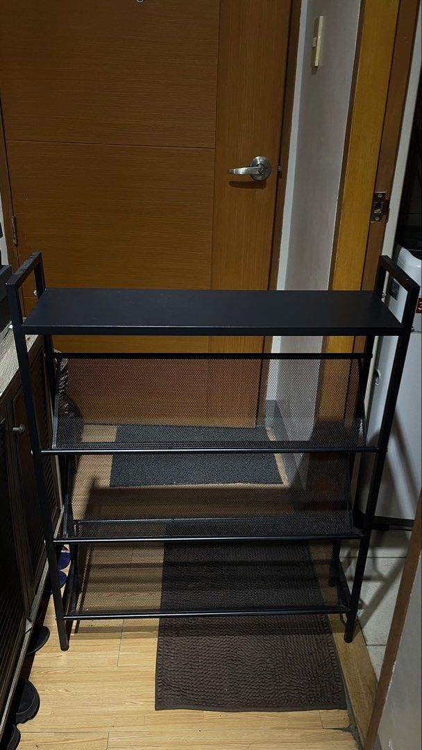 Shoe Rack 4 layer black (Category: Shoe inserts & accessories) located in Paranaque City. Submitted by ronaabell (Listing ID 1465425452, Image 1). Description: height: 90cm width : 70 cm Issue : hindi pantay yung dalawang paa sa isang side so kahit wag ng lagyan ng rubber base at no need higpitan yung isang rubber base para pumantay. Orig price : 800 sa tiktok ko nabili Rfs : bawas gamit din.