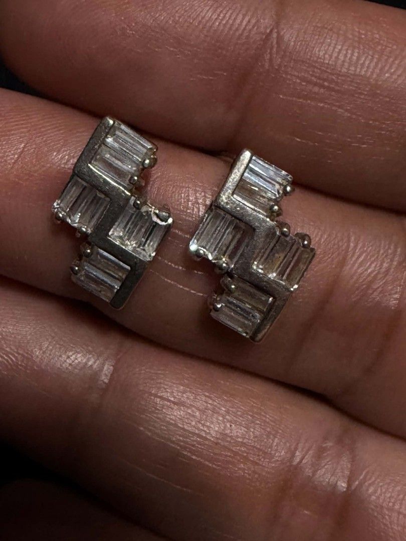 Silver 925 Geometric Baguette Crystal Stud Earrings (Category: Earrings) located in Abucay. Submitted by thrifty.picked (Listing ID 1465526293, Image 1). Description: - Design: Geometric stepped zig-zag style - Stones: Baguette-cut crystals with amazing sparkle no pakaw but can provide silicone lock - Material: Silver 925metal - Closure: Secure back posts - Condition: Ready to wear.