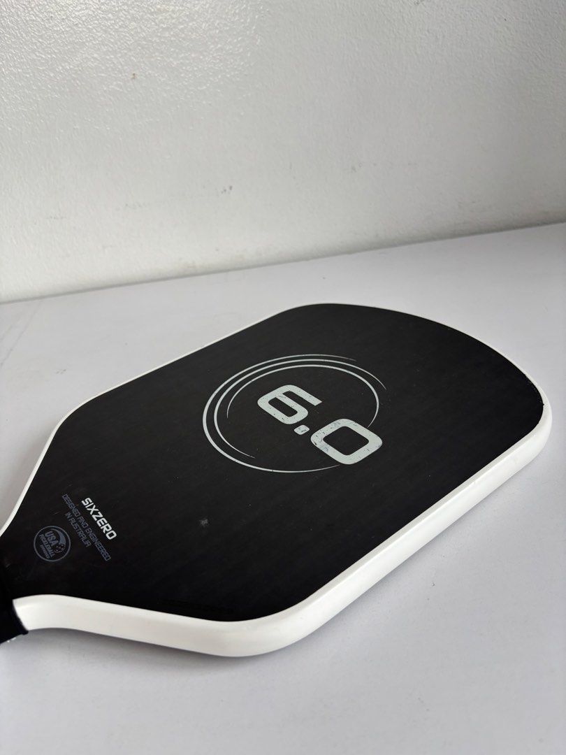Six Zero Double Black Diamond Infinity Pickleball Paddle (16mm) (Category: Racket and Ball Sports) located in Pasig City. Submitted by yurilats_ (Listing ID 1465435075, Image 3). Description: Six Zero Double Black Diamond Infinity (16mm) - Condition: Pre-owned. Has minor cosmetic scuffs on the edge guard from normal play, but the carbon face surface and core are in solid condition with plenty of spin left. - Tip: Scuffs can easily be covered by a