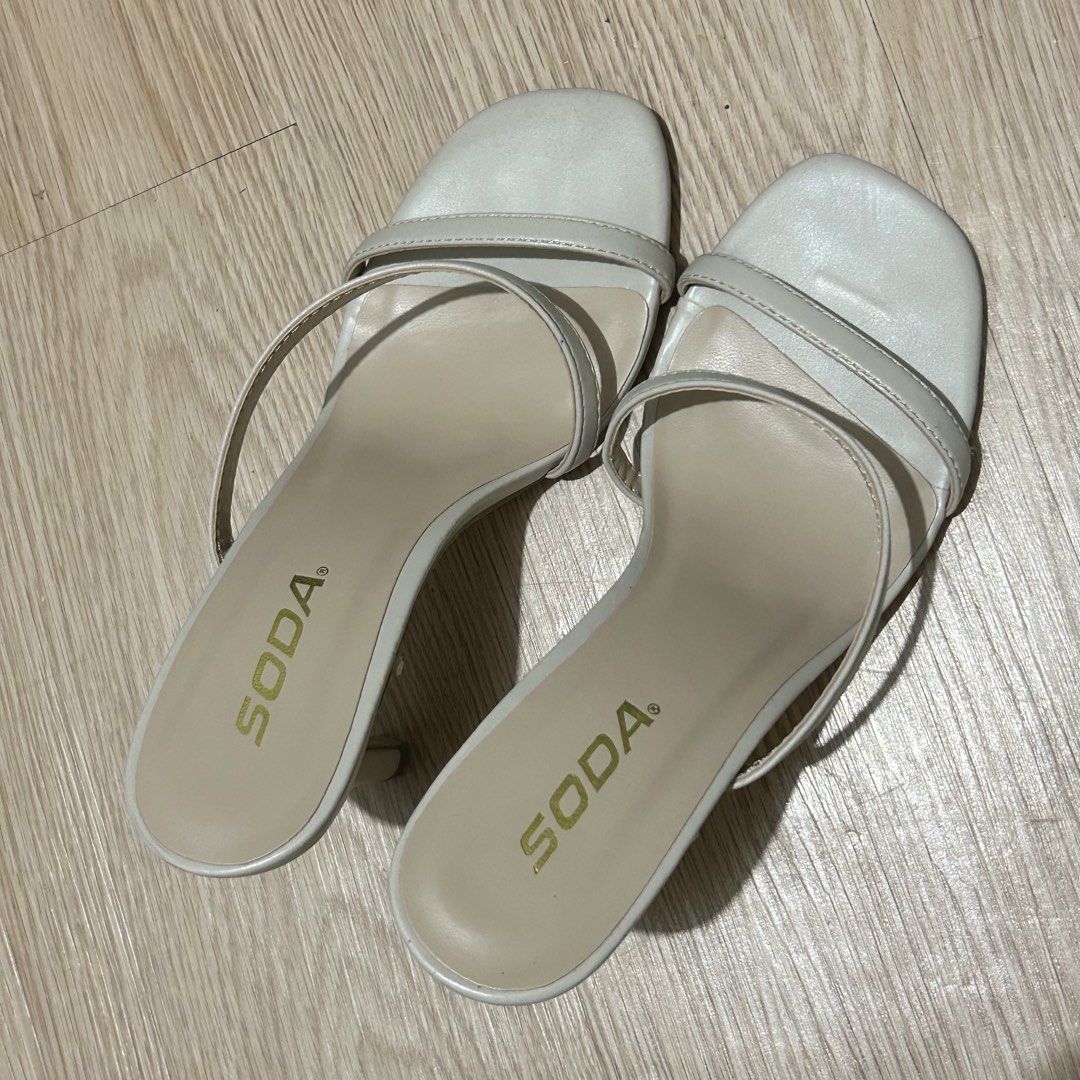SODA Cream Strappy Stiletto Heels (Category: Heels) located in Dasmarinas. Submitted by lunabobbie (Listing ID 1465479536, Image 1). Description: - Brand: SODA - Style: Slim strappy slip-on heels with high stiletto heels and open square toe - Color: Neutral beige (versatile and easy to match) - Condition: Minimal wear, very clean insoles and soles - Perfect for: Casual outings, dates, and formal events.