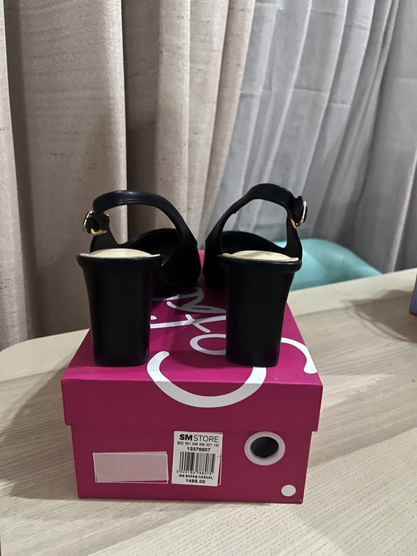 Sofab Black Vivienne Heels Size 39 (Category: Heels) located in Mandaue City. Submitted by zinniaxclaire (Listing ID 1465540823, Image 3). Description: - Brand: Sofab - Style: Vivienne slingback heels with chunky block heel and pointed toe - Color: Black - Size: 39 - Details: Adjustable ankle strap with gold-tone buckle - Inclusions: Original pink branded shoebox, protective dust wrapping, and retail tag (1,499 PHP) - used during graduation rites