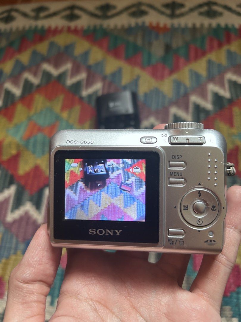 Sony Cyber-shot DSC-S650 7.2MP Digital Camera (Category: Cameras) located in Pandi. Submitted by demmyyy (Listing ID 1465519428, Image 1). Description: Camera Details: • 7.2 Megapixels • 3x Optical Zoom • Condition: 100% No functional issues. Crisp Outputs, Flash, zoom, and all buttons are working perfectly. • Cosmetic Condition: 8.5/10 (few minor scratches but barely visible & 2 white dots on screen not affecting the outputs) Inclusions: • Camer