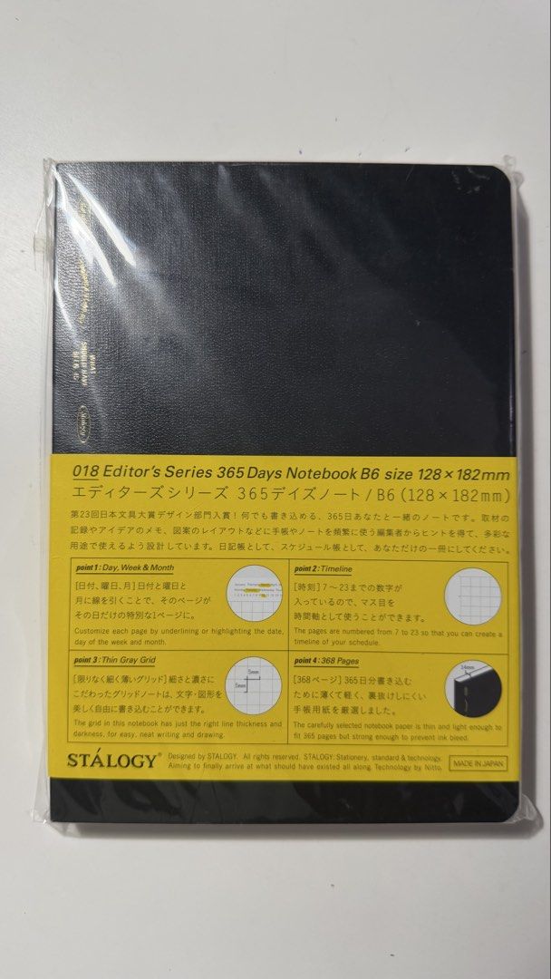 STALOGY Editor's Series 365 Days Notebook B6 Black (Category: Stationery & School Supplies) located in Rizal. Submitted by artandjournals (Listing ID 1465568141, Image 1). Description: - Brand: STALOGY by Nitoms (Made in Japan) - Condition: Brand new, still sealed in original plastic wrapping - Size: B6 (128 x 182 mm) - Cover: Sleek Black - Pages: 368 thin gray grid pages - Features: Built-in day, week, month markers and 7-23 timeline - Perfect f