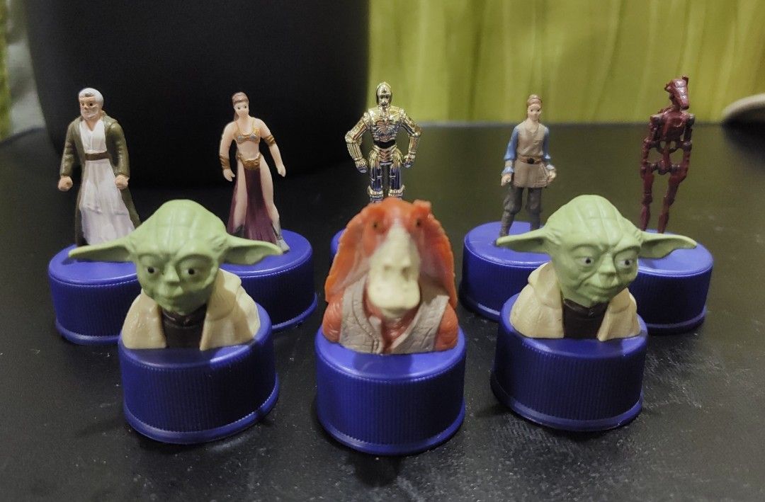 Star Wars Bottle Cap Mini Figures Set of 7 (Category: Figurines & Statues) located in Manila. Submitted by livedolphin_68dee2 (Listing ID 1465443944, Image 1). Description: - Complete set of 7 Star Wars character mini figures - Mounted on unique blue bottle caps - Includes Yoda, Obi-Wan Kenobi, Princess Leia (slave outfit), C-3PO, Jar Jar Binks, Anakin Skywalker, and a battle droid - Great collectible items and desktop display pieces for fans - S