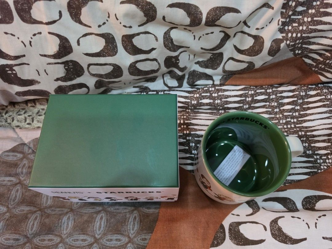 Starbucks + Peanuts Ceramic Mug (Category: Water Bottles & Tumblers) located in Quezon City. Submitted by petite_kopichesg (Listing ID 1465437650, Image 2). Description: Starbucks + Peanuts 14 ounce ceramic mug Brand new Excess All sales are final No return, no refund Will not release item if not yet paid.