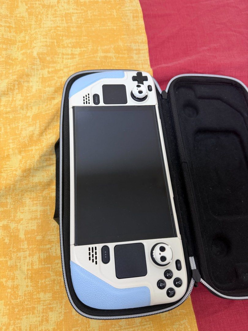 Steam Deck OLED 512GB (Category: PlayStation) located in Manila. Submitted by isavibes (Listing ID 1465445355, Image 3). Description: Selling some of my partner's pre-loved gaming items. All items are well taken care of and in good condition. Actual photos posted. 🎮 STEAM DECK OLED 512GB * Rarely used * 100% Battery Health * No dents * No known issues * Complete box * With original receipt from DataBlitz * Well maintained // Can opt to buy its s