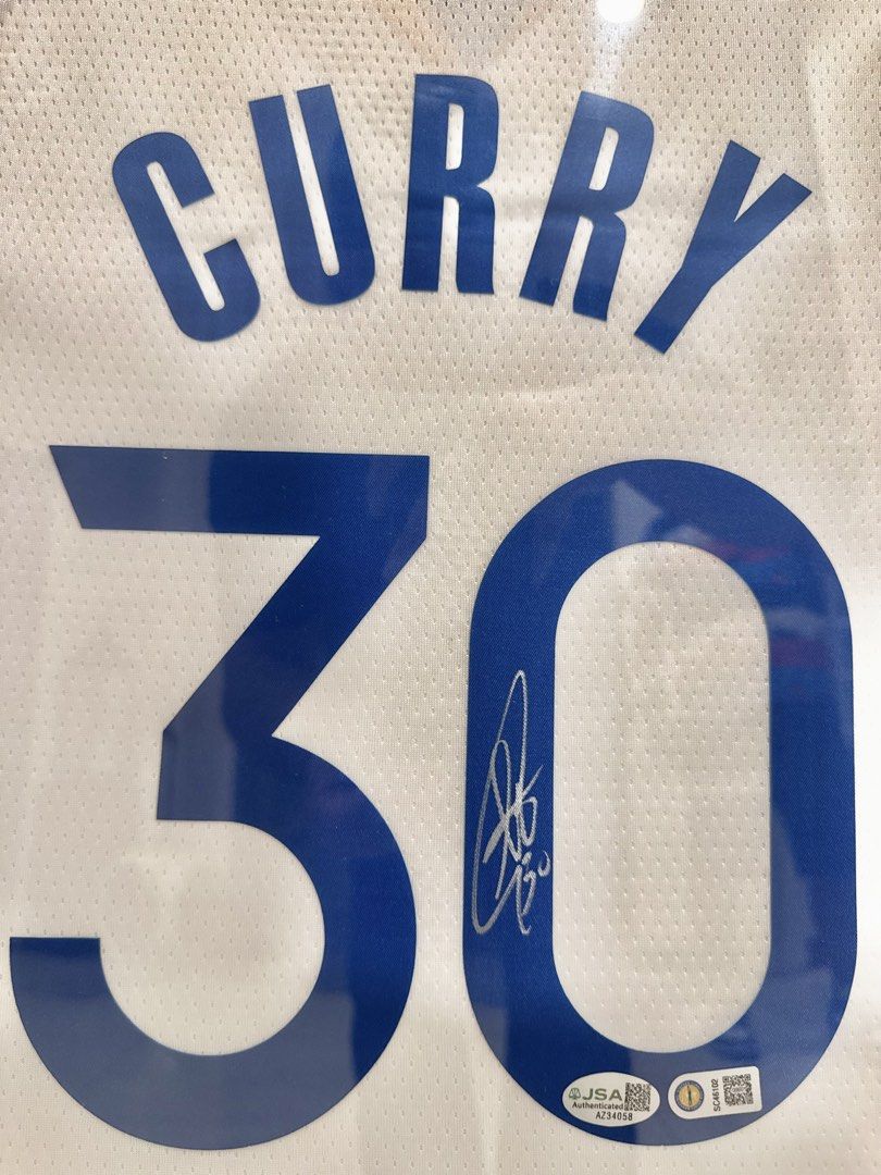 Stephen Curry Signed Nike Swingman Jersey (Category: Activewear) located in Manila. Submitted by beaudgsp (Listing ID 1465390564, Image 2). Description: Stephen Curry Signed Nike Swingman White Jersey Professionally framed and displayed behind glass 100% certified by JSA with authentication hologram AZ34058 Includes original USA Sports Marketing tags Rare collector's item for NBA fans and memorabilia enthusiasts Meet-ups or shipping options avail