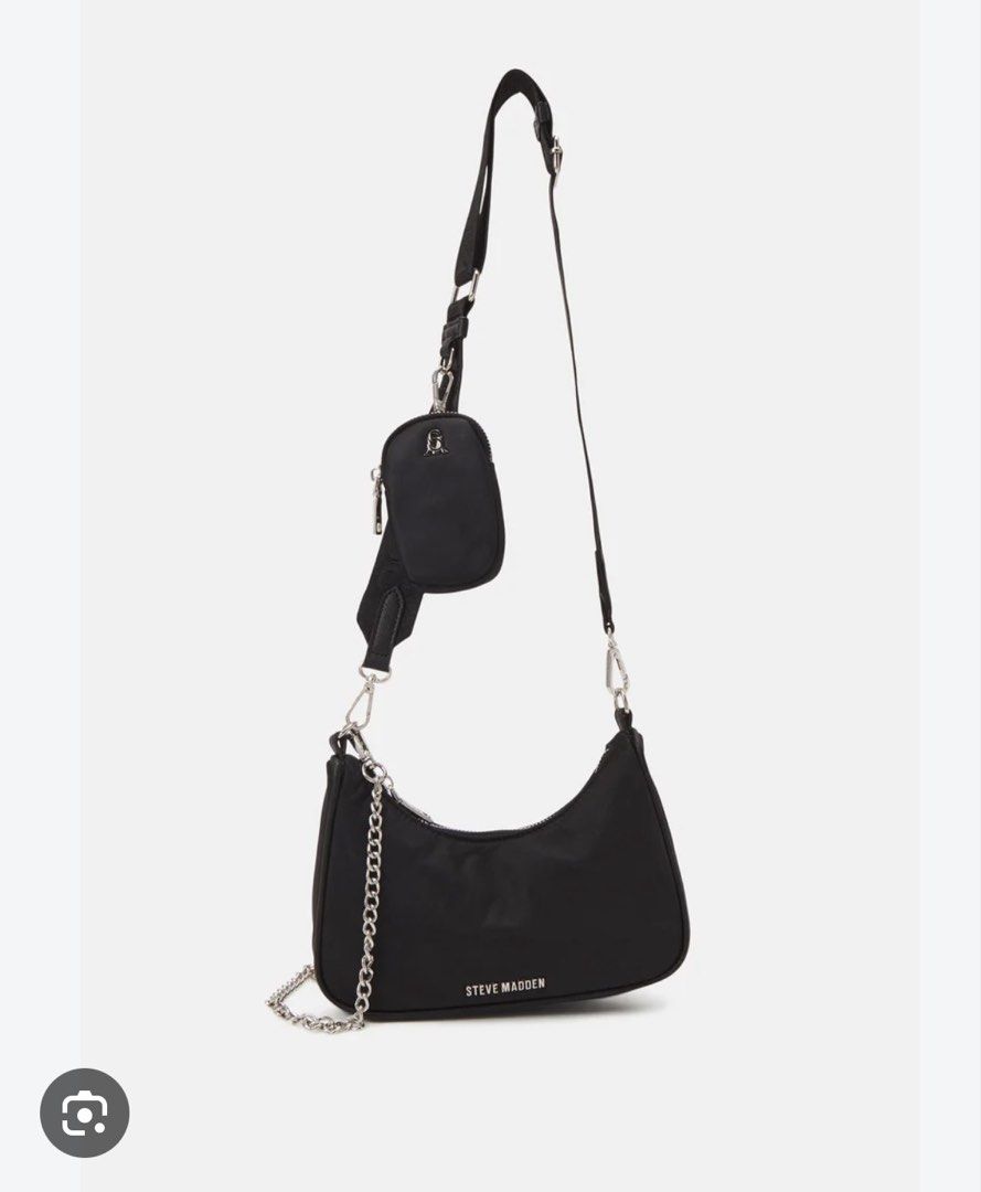 Steve Madden BVITAL nylon bag (Category: Cross-body Bags) located in Manila. Submitted by prelovedbyandss (Listing ID 1465538281, Image 1). Description: Used a few times Bag is still in good condition Chain strap not available Detachable pouch is still available pero nasira lang sa sabitan that is why selling low Negotiable .