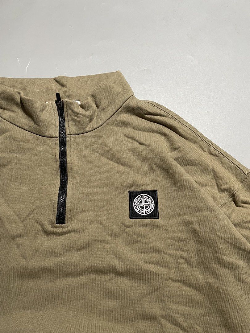 Stone Island Quarter Zip Sweatshirt (Category: Coats, Jackets and Outerwear) located in Taguig. Submitted by sellnbustle (Listing ID 1465478490, Image 2). Description: Stone Island Quarter Zip Sweatshirt Embroidered logo 24.5x25 Very good condition Complete tags Minor ballpen marks (washable) .