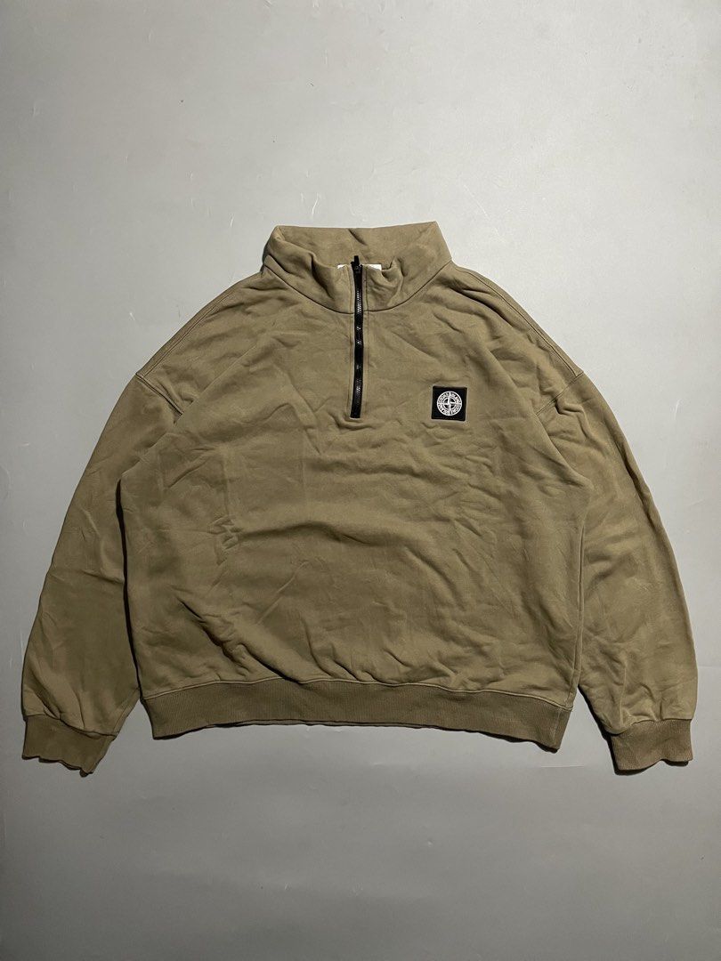 Stone Island Quarter Zip Sweatshirt (Category: Coats, Jackets and Outerwear) located in Taguig. Submitted by sellnbustle (Listing ID 1465478490, Image 1). Description: Stone Island Quarter Zip Sweatshirt Embroidered logo 24.5x25 Very good condition Complete tags Minor ballpen marks (washable) .