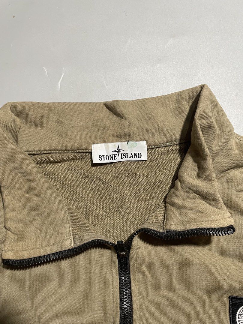 Stone Island Quarter Zip Sweatshirt (Category: Coats, Jackets and Outerwear) located in Taguig. Submitted by sellnbustle (Listing ID 1465478490, Image 3). Description: Stone Island Quarter Zip Sweatshirt Embroidered logo 24.5x25 Very good condition Complete tags Minor ballpen marks (washable) .