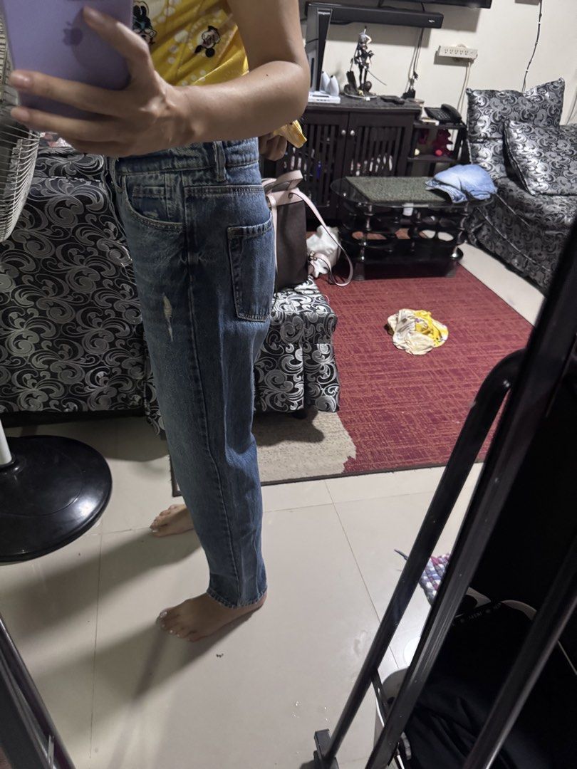 Stradivarius Blue Denim Jeans Size 36 (Category: Jeans) located in Pasig City. Submitted by rowie_08 (Listing ID 1465514981, Image 2). Description: - Brand: Stradivarius - Size: 28-30 - Style: Classic high-waist mom fit - Color/Wash: Medium wash blue denim - Details: Slight distressing near the pocket, soft and comfortable material, front and back pockets - Origin: Made in Bangladesh - Condition: Great for everyday casual wear.