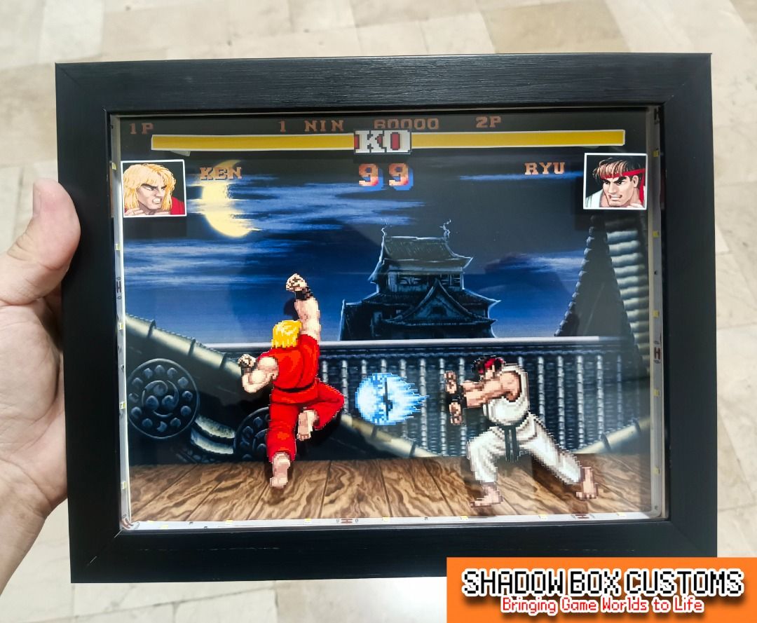 Street Fighter 2 Video Game Shadow Box - Ken vs Ryu (Category: Nintendo) located in Quezon City. Submitted by natzuki10 (Listing ID 1465397048, Image 2). Description: Street Fighter 2 Video Game Shadow Box - Ken vs Ryu Height: 8 inches Width: 10 inches *Handmade Pixel Shadow Boxes *Accepting Customized Designs *Perfect for Gamers & Collectors #videogames #nintendo #playstation #roomdecor #collection #gamer #gift.