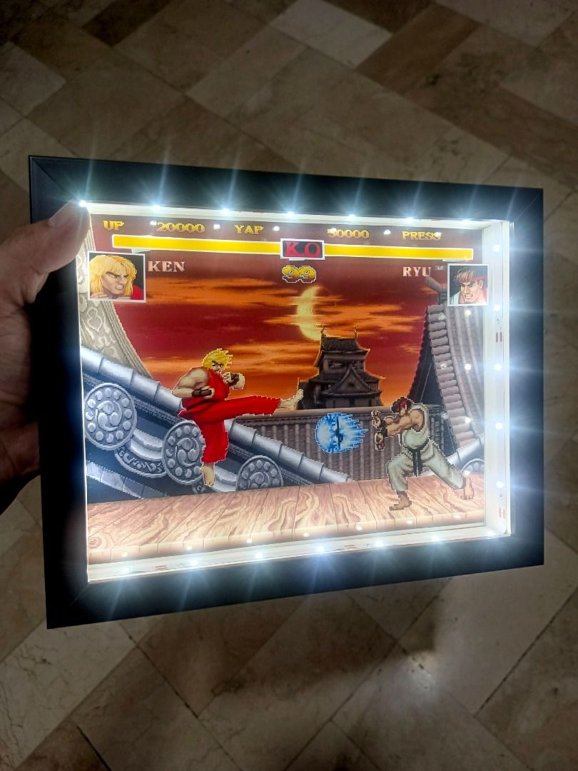 Street Fighter 2 Video Game Shadow Box - Ken vs Ryu (Category: Nintendo) located in Quezon City. Submitted by natzuki10 (Listing ID 1465397048, Image 3). Description: Street Fighter 2 Video Game Shadow Box - Ken vs Ryu Height: 8 inches Width: 10 inches *Handmade Pixel Shadow Boxes *Accepting Customized Designs *Perfect for Gamers & Collectors #videogames #nintendo #playstation #roomdecor #collection #gamer #gift.