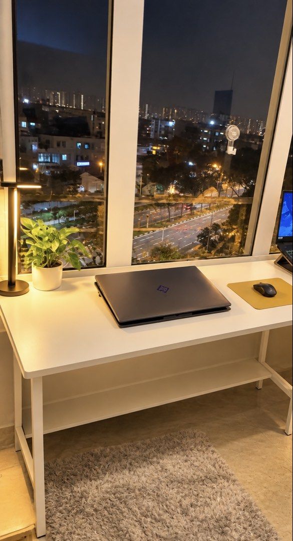 Study table (Category: Tables & Sets) located in Singapore. Submitted by xinyi24 (Listing ID 1465484204, Image 1). Description: - Brand/Model: HP OMEN Gaming Laptop - Color: Dark grey with sleek lid design - Accent: Distinctive blue logo in the center - Condition: Pristine, well-maintained - Ideal for: Gaming, work, and clean desk setups.