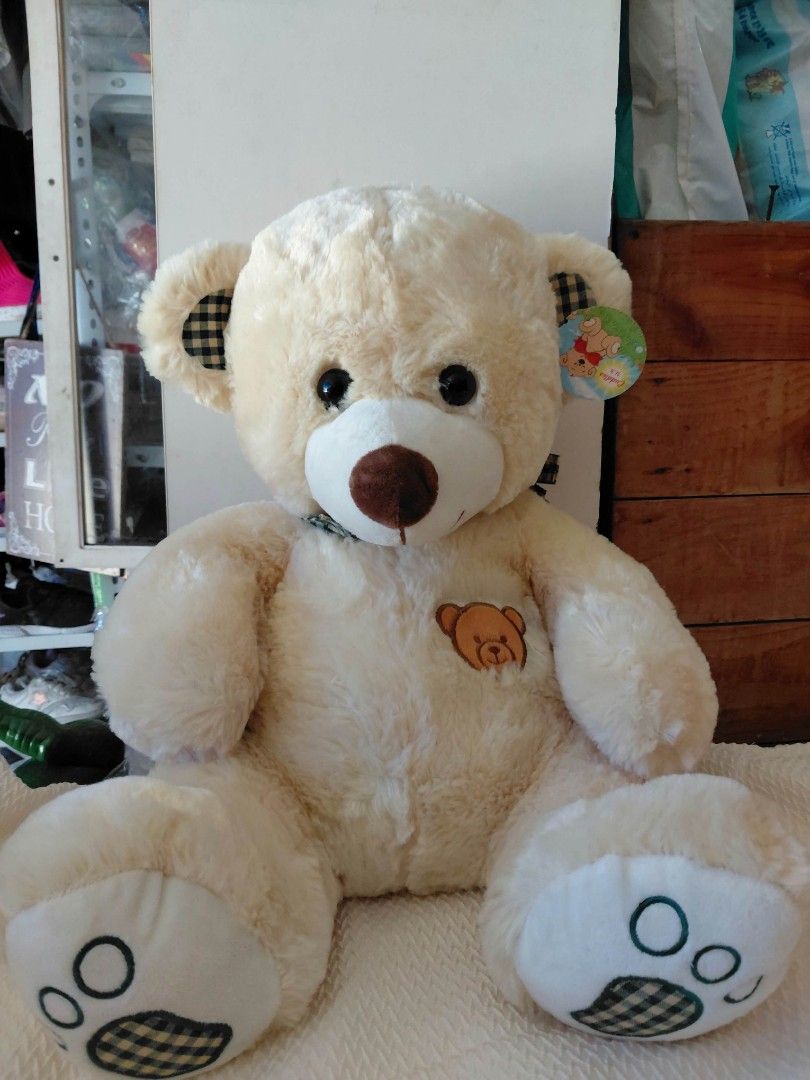 Stuffed toy (Category: Kids Toys) located in Manila. Submitted by rubymielbona (Listing ID 1465413955, Image 1). Description: - Made with ultra-soft and fluffy plush material for maximum cuddling - Features charming plaid patterned accents on the ears and paw pads - Sweet little embroidered bear patch detail on the chest - Great gift idea for kids, loved ones, or as cozy room decor.