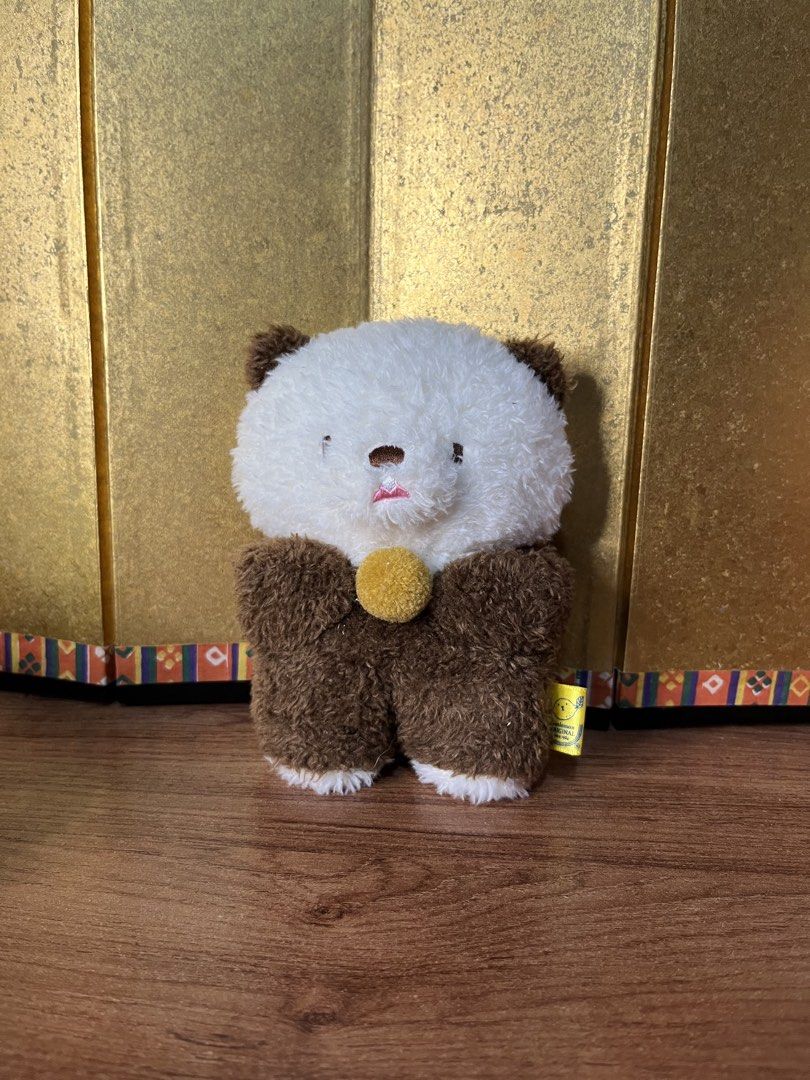Sun Lemon Fluffy Tatton Sea Otter Plush (Category: Plushies & Soft Toys) located in Gapan. Submitted by lunashop14 (Listing ID 1465562591, Image 1). Description: - Brand: Sunlemon Original (Designed in Tokyo) - Condition: Brand new / Excellent - Design: Fluffy brown and white fur with a detailed embroidered face and tiny pink tongue - Special Feature: Holding a small round yellow ball - Authenticity: Comes with the official yellow fabric tag on t