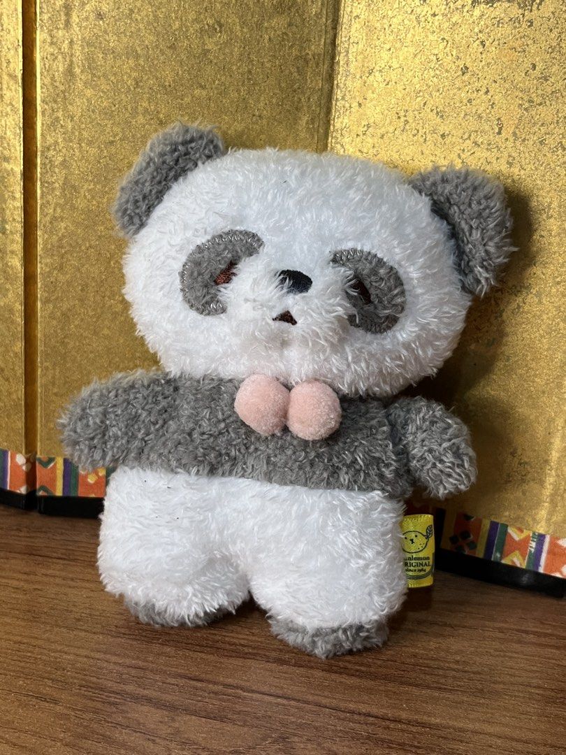Sunlemon Fluffy Tatton Panda Plush (Category: Plushies & Soft Toys) located in Gapan. Submitted by lunashop14 (Listing ID 1465562699, Image 2). Description: - Authentic Sunlemon original panda plush - Super soft, fuzzy grey and white texture with sweet pink cheeks - Official yellow tag attached on the side - Designed in Tokyo, made in China - Pristine condition from a clean, smoke-free home.