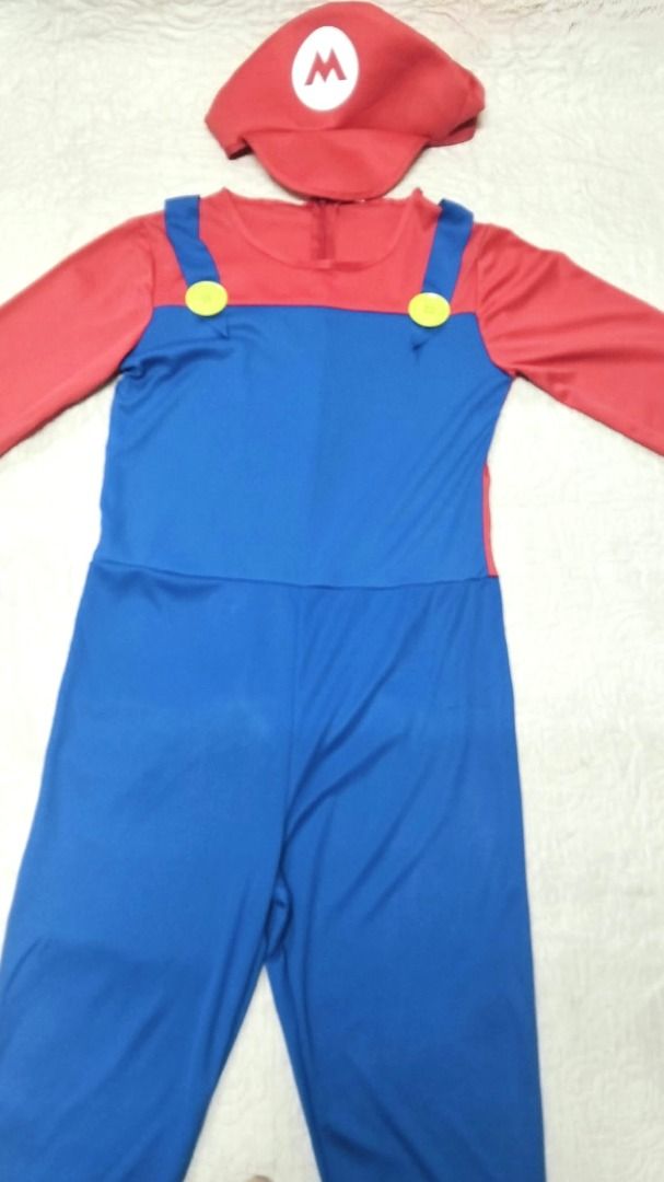 Super Mario Costume with Hat (Category: Babies & Kids Fashion) located in Taguig. Submitted by Bloomscorner1 (Listing ID 1465527022, Image 2). Description: ✅ Complete Mario costume set including jumpsuit and matching red hat ✅ Features a red long-sleeve top attached to blue overalls with yellow buttons ✅ Iconic white 'M' logo on the front of the cap ✅ Convenient zipper closure at the back neck ✅ Ideal for cosplay events, Halloween parties, or cos