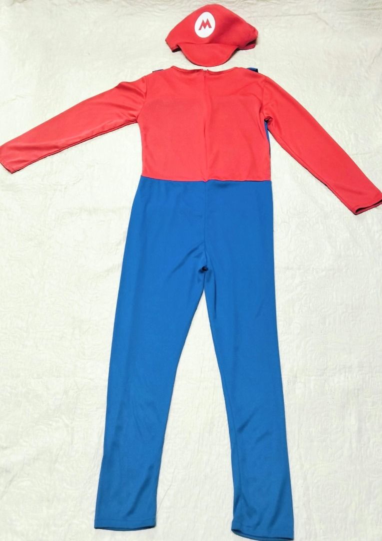 Super Mario Costume with Hat (Category: Babies & Kids Fashion) located in Taguig. Submitted by Bloomscorner1 (Listing ID 1465527022, Image 3). Description: ✅ Complete Mario costume set including jumpsuit and matching red hat ✅ Features a red long-sleeve top attached to blue overalls with yellow buttons ✅ Iconic white 'M' logo on the front of the cap ✅ Convenient zipper closure at the back neck ✅ Ideal for cosplay events, Halloween parties, or cos