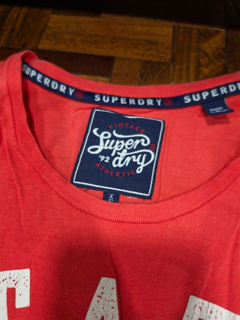 Superdry Red Graphic T Shirt (Category: Shirts) located in Quezon City. Submitted by snowflakes.specials (Listing ID 1465448951, Image 2). Description: Size XS Good condition.