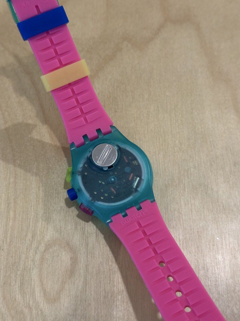 Swatch Chrono Flash Arrow SCL100 Multicolor Watch (Category: Women's Watches) located in Pasig City. Submitted by cosmicjuice08 (Listing ID 1465386944, Image 2). Description: Barely worn and still in like-new condition. - Model: Swatch Chrono SUSG408 - Condition: Brand new, unworn with original box set and paperwork dated Feb 2025 - Dial: Colorful multi-tone design with yellow sub-dials and tachymeter bezel .
