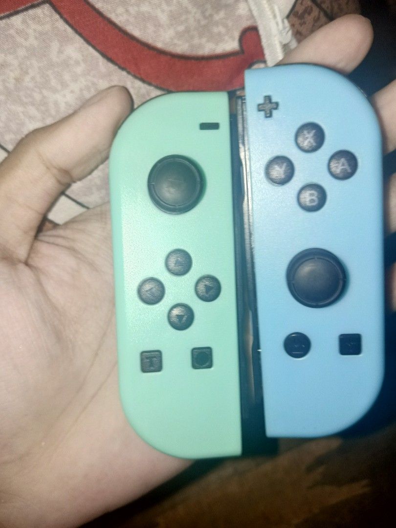 Switch joycon with dock joycon charger (Category: Controllers) located in Mandaluyong City. Submitted by consoleflip (Listing ID 1465515952, Image 1). Description: Switch joycon 3rd party no issue with joycon docking charger No drift all button working Price:800 bundle Nalang Location: Mandaluyong meet up or lalamove.