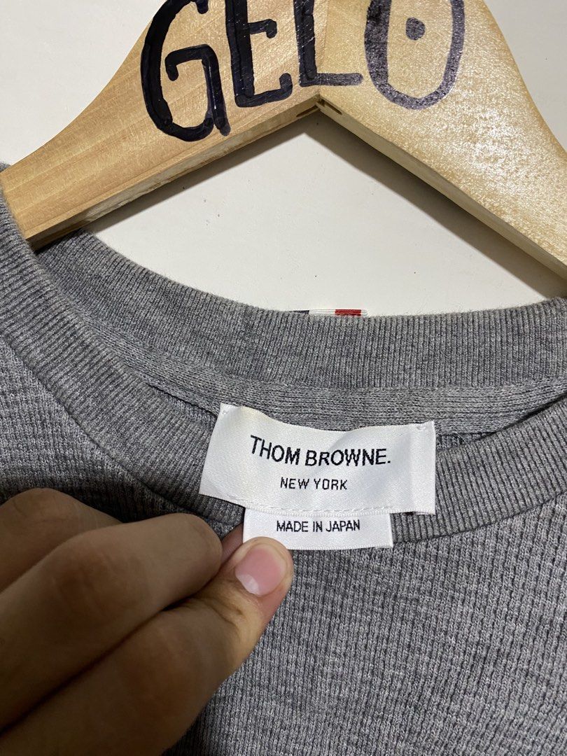 THOM BROWNE LONGLSLEEVE WAFFLE KNIT (Category: Coats, Jackets and Outerwear) located in Cagayan de Oro. Submitted by ansasalab39908 (Listing ID 1465529137, Image 2). Description: Size S (W20xL25) Condition: Vgoodcondition Color rate:9.8/10 Flaws:scratch.