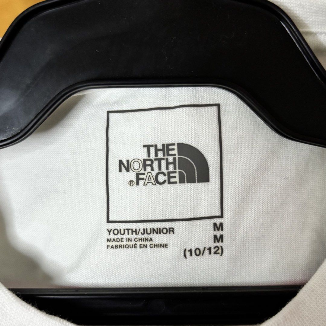 TNF kids t-shirt (Category: Babies & Kids Fashion) located in Valenzuela. Submitted by thriftynanay88 (Listing ID 1465449741, Image 3). Description: Size 10-12Y on tag.