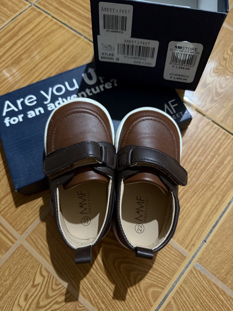 Toddler Shoes Size 22 / 13.5cm (Category: Babies & Kids Fashion) located in Quezon City. Submitted by wunderbare (Listing ID 1465562809, Image 1). Description: Used once for photoshoot only. Fits 9-12 months - Brand: Meet Your Feet (Atlas) - Color: Brown with white and gum rubber soles - Size: 22 - Condition: Like new with original blue box and SM Store tags - Features: Secure hook-and-loop strap and MMF branding on the sole.