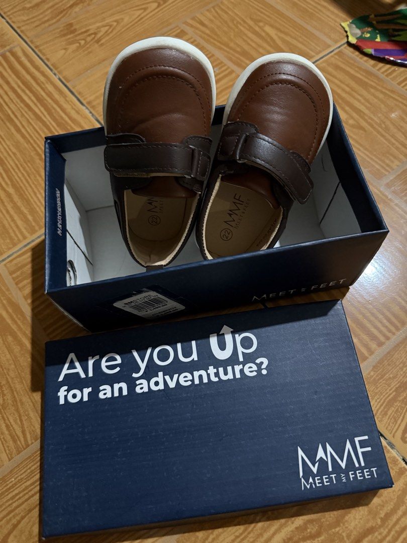 Toddler Shoes Size 22 / 13.5cm (Category: Babies & Kids Fashion) located in Quezon City. Submitted by wunderbare (Listing ID 1465562809, Image 3). Description: Used once for photoshoot only. Fits 9-12 months - Brand: Meet Your Feet (Atlas) - Color: Brown with white and gum rubber soles - Size: 22 - Condition: Like new with original blue box and SM Store tags - Features: Secure hook-and-loop strap and MMF branding on the sole.