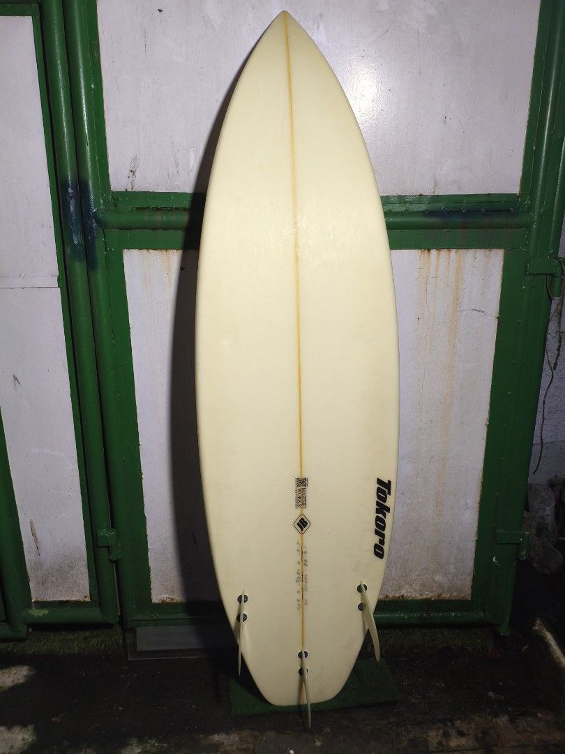 Tokoro Surfboard with Creatures Board Bag (Category: Water Sports) located in Manila. Submitted by tonio124 (Listing ID 1465463424, Image 3). Description: - Brand/Shaper: Tokoro Surfboard - Glassing: Master Works - Dimensions: 5'9" x 18 7/8" x 2 1/4" - Setup: Thruster with futures fin boxes - Inclusions: Red padded travel bag, Leash - Condition: Minor yellowing due to age, water-tight and ready to shred for your next session.