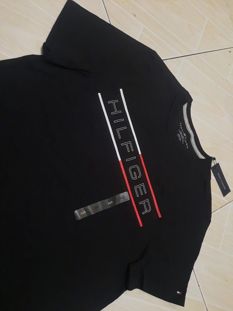 tommy hilfiger logo print tee (authentic) (Category: Tshirts & Polo Shirts ) located in Tarlac. Submitted by thryftstash (Listing ID 1465405020, Image 2). Description: dimes: 27.5 - 19 S on tag issue: none sf not included tarlac loc j&t and lbc courier.