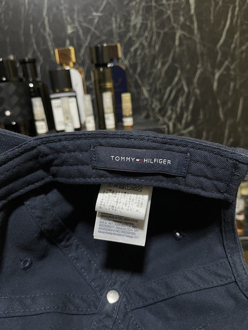 Tommy Hilfiger Navy Blue Cap (Category: Caps & Hats) located in Quezon City. Submitted by eugxp (Listing ID 1465457386, Image 2). Description: This is an original Tommy, not fake, UA, or anything else you called it. I bought this in a EVERRICH duty-free in Taiwan. No other issues aside from needing to clean them. Selling for 2,000. If you read this, the last price is 1,700. .