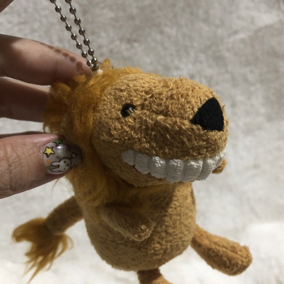 Toothy Lion Charm (Category: Plushies & Soft Toys) located in Quezon City. Submitted by kitsune.treasures (Listing ID 1465495905, Image 2). Description: *First to pay policy! *1 day reservation only. Failure to pay on time, auto cancel. 📍Quezon City * MOD: J&T | Lalamove * MOP: GCASH | BPI 📦ON HAND AND READY TO SHIP! CONDITION: WHAT YOU SEE IS WHAT YOU GET. Dimensions: Kindly check the photos for the actual measurements. Please check all the ph