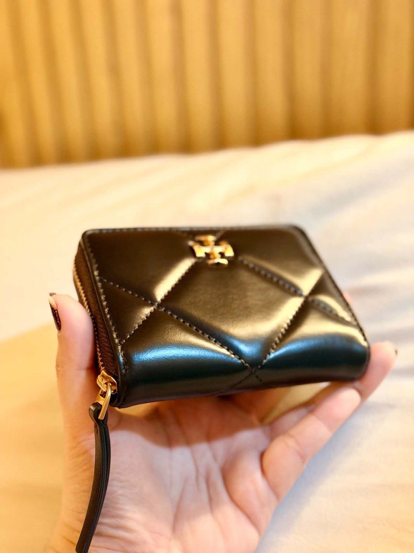 Tory Burch Black Quilted Leather Zip Around Wallet (Category: Luxury Bags & Wallets) located in Manila. Submitted by iamsassycl95926 (Listing ID 1465465519, Image 3). Description: - Brand: Tory Burch - Material: Black quilted leather with gold-tone hardware & iconic double T logo - Closure: Zip-around with leather pull tab - Interior: Light grey leather/fabric lining, multiple card slots, slip pockets, and central zippered coin compartment - Size