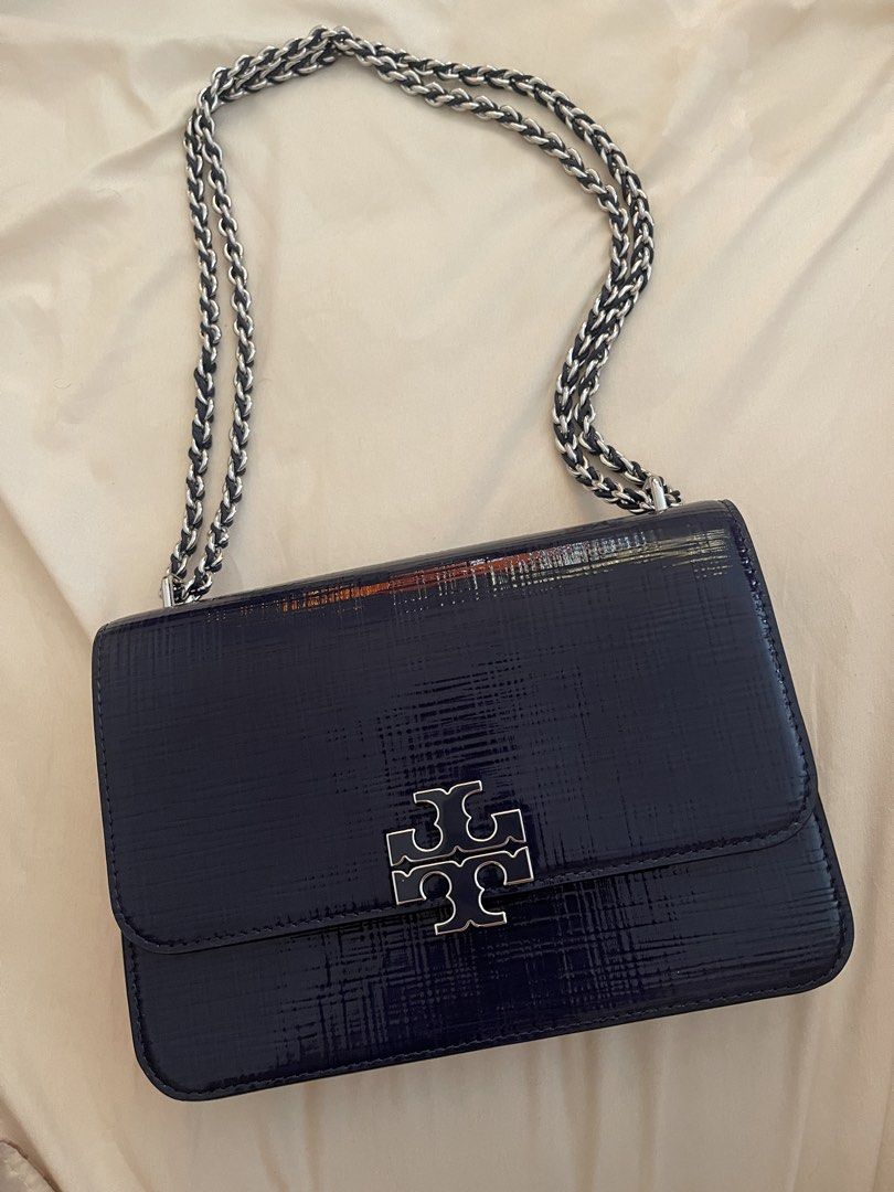Tory Burch Britten Textured Patent Small Shoulder Bag (Category: Luxury Bags & Wallets) located in Makati City. Submitted by happywind.f243c0 (Listing ID 1465499328, Image 2). Description: .
