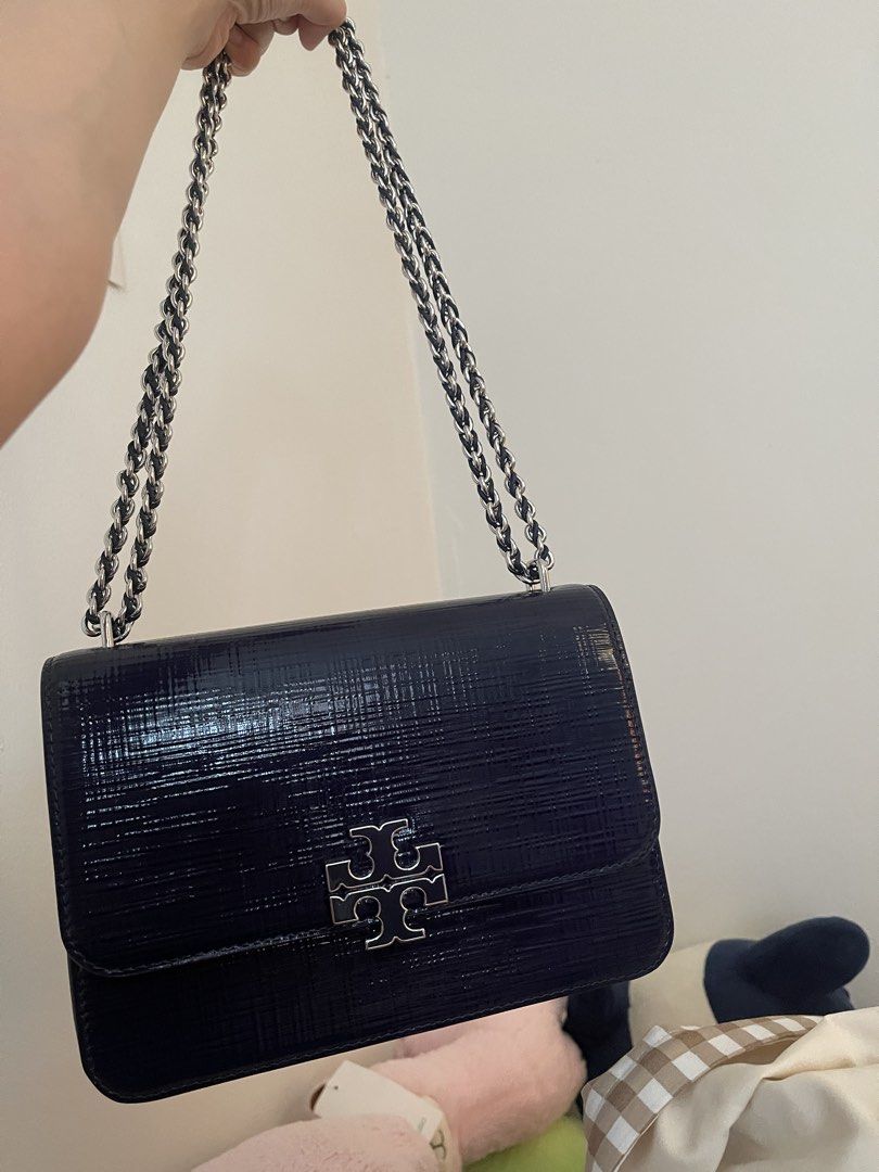 Tory Burch Britten Textured Patent Small Shoulder Bag (Category: Luxury Bags & Wallets) located in Makati City. Submitted by happywind.f243c0 (Listing ID 1465499328, Image 3). Description: .