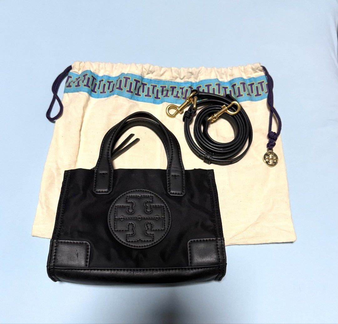 Tory Burch Ella Mini Nylon (Category: Tote Bags) located in Quezon City. Submitted by thriftream (Listing ID 1465445934, Image 1). Description: - Brand: Tory Burch - Style: Mini Tote / Crossbody Bag - Material: Durable nylon with leather trim - Color: Classic Black with gold-tone hardware - Features: Zip-top closure, lined interior, embossed front logo - Strap: Dual top handles + adjustable and detachable leather crossbody strap - Inclusions: Ori