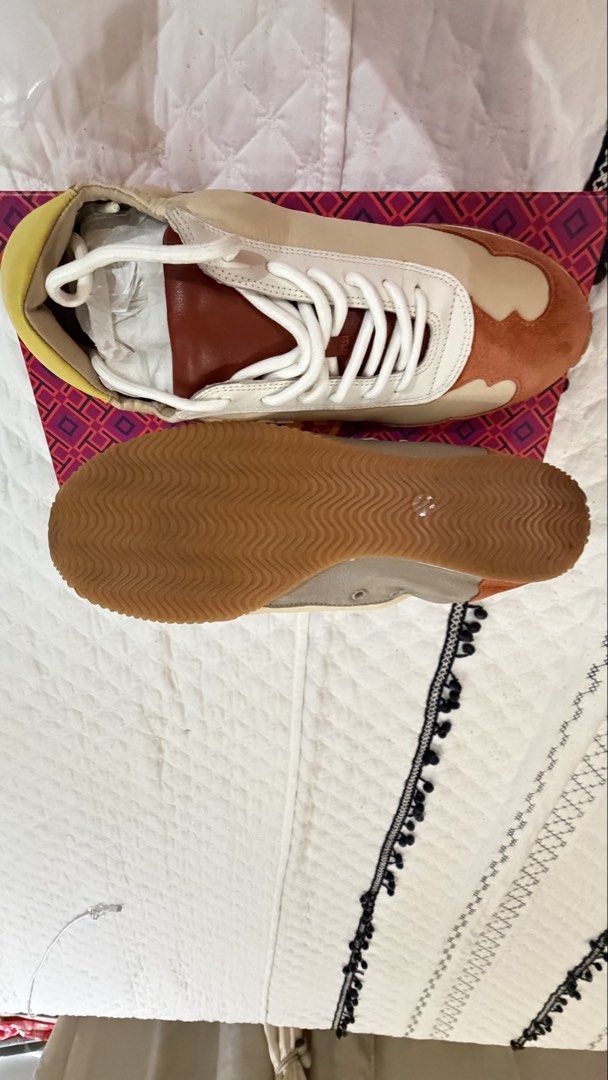 Tory Burch Tory Sneaker - Nylon / Calf Leather (Category: Sneakers) located in Mandaluyong City. Submitted by lizbeth031274 (Listing ID 1465428922, Image 3). Description: - Brand: Tory Burch - Model: Tory Sneaker - Color: New Ivory and Rust - Size: US 9 - Material: Nylon and calf leather upper with suede details, rubber sole - Inclusions: Original box and tissue paper included - Condition: Brand new with box.