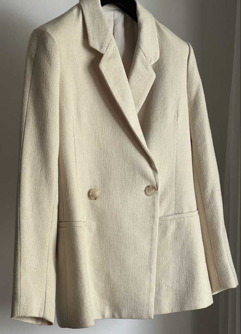Toteme tweedish double br. blazer (Category: Coats, Jackets and Outerwear) located in Quezon City. Submitted by raccoonfur (Listing ID 1465419004, Image 1). Description: Toteme oatmeal textured blazer. Rounded tailored details that really prop up your proportions when worn. Great condition. Flat measurements: Pit to pit 47.25cm/18.5in Waist 45cm/17.75in Shoulders 39.25cm/15.4in Length 71.75cm/28.1in Sleeve inseam 41cm/16.1in Sleeve length 60cm/23