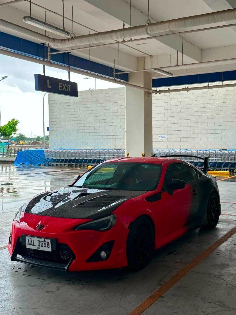 Toyota 86 2.0 GS (M) (Category: Used Cars) located in Manila. Submitted by jjaminal (Listing ID 1465437910, Image 2). Description: 2013 / 2014 Toyota GT86 Aero Manual Complete papers and 2 keys Owner/Seller unit Details & Modifications: • Mileage: 38,xxx km only • original aero version top of the line • 18” Rota mags w/ 90% tire tread • Vland headlights, taillights & 3rd brake light • Varis triple vent carbon hood • Tein Flex Z coilovers • Custom