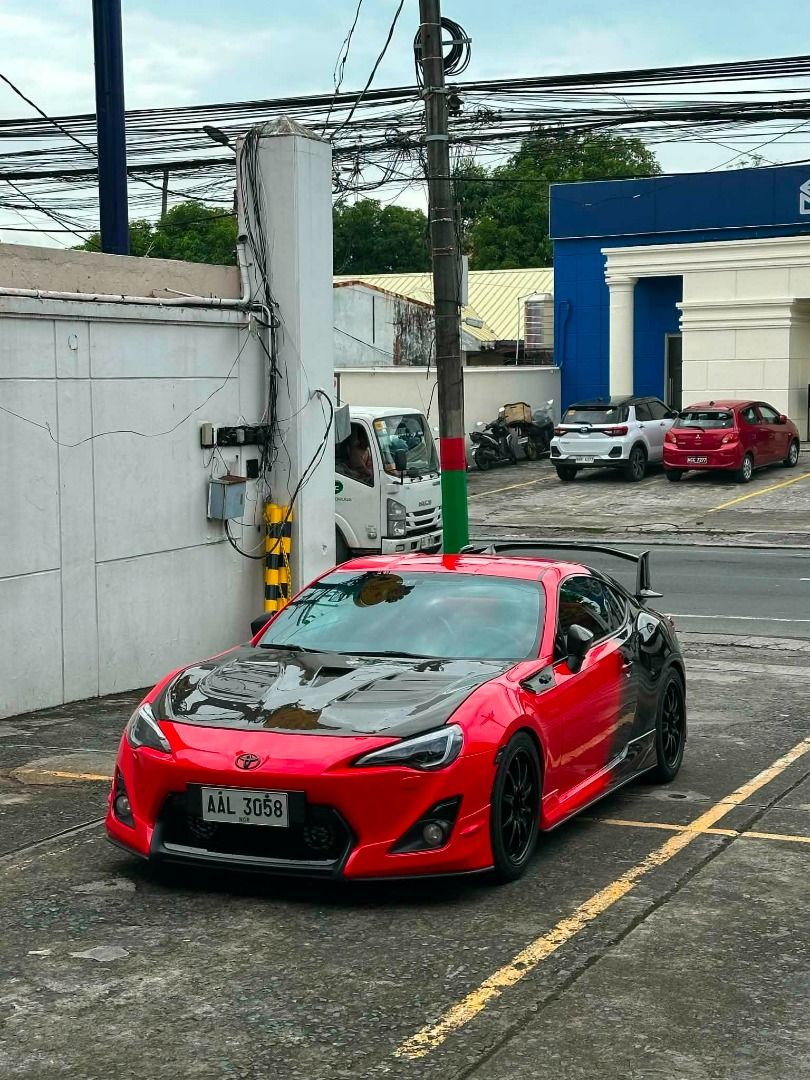 Toyota 86 2.0 GS (M) (Category: Used Cars) located in Manila. Submitted by jjaminal (Listing ID 1465437910, Image 3). Description: 2013 / 2014 Toyota GT86 Aero Manual Complete papers and 2 keys Owner/Seller unit Details & Modifications: • Mileage: 38,xxx km only • original aero version top of the line • 18” Rota mags w/ 90% tire tread • Vland headlights, taillights & 3rd brake light • Varis triple vent carbon hood • Tein Flex Z coilovers • Custom