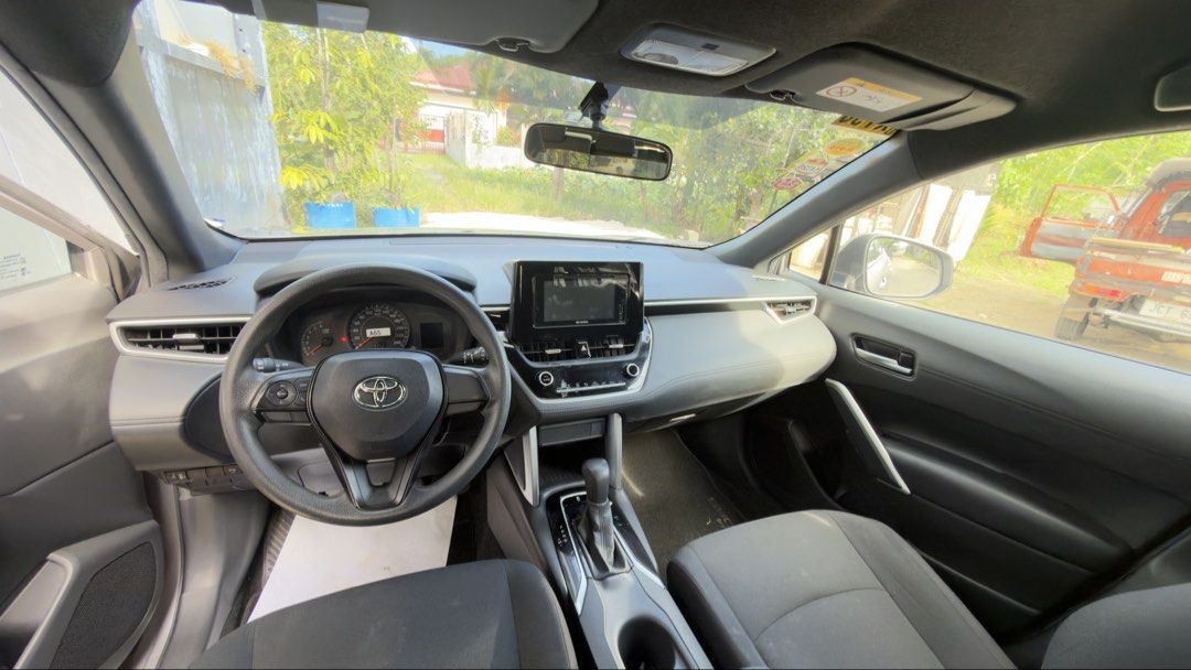 Toyota Corolla Cross 1.8G Auto (Category: Used Cars) located in Quezon City. Submitted by mnicnic (Listing ID 1465510599, Image 3). Description: For Sale My 2021 Toyota Corolla Cross 1.8 G No issues Complete papers Open for scanning, you may bring your mechanic Odo: 56k FREE FULL TANK Features: Smart entry Push start Headunit Auto retractable side mirrors Spacious Cabin LED Fog lights Projector Headlights Spare Tire with tools Booklets and manual