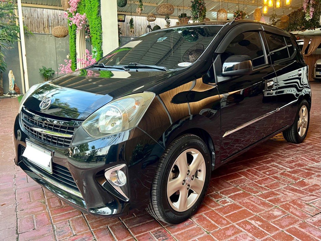 Toyota Wigo (Category: Used Cars) located in Las Pinas. Submitted by andy_francisco. (Listing ID 1465468297, Image 2). Description: -2017 Toyota Wigo G (Top of the Line) -Automatic transmission -50K mileage only -All papers under my name -New 15” Toyota OEM mags with Sailun tires (2K km used) -Android head unit with reverse camera, Apple CarPlay & Android Auto -JBL speakers -LED lights worth ₱15K -Bosch Europa horn -Newly completed major PMS, ful