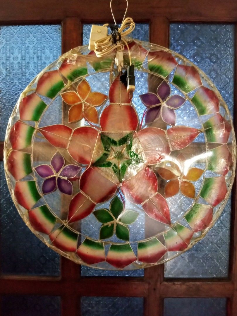 Traditional Capiz Shell Christmas Star Parol Lantern (Category: Lighting) located in Quezon City. Submitted by blacked.market (Listing ID 1465511019, Image 2). Description: Dimensions: Lengh -20 Inches Width -20 Inches Notes: - Damaged Plug. Mode of Payment: Gcash/Cash Pickup Delivery: Should be arranged by the Buyer (Payment first before pickup of item). Thanks for viewing. Check out my other listings.🙂.