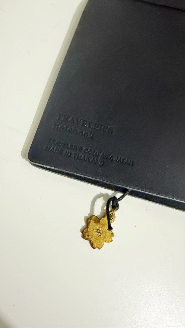 Traveler's Notebook Tokyo + Charms (Category: Stationery & School Supplies) located in Rizal. Submitted by artandjournals (Listing ID 1465514750, Image 3). Description: Traveler’s Notebook Regular Size Will come with box and cloth pouch No inserts Will come with the charms in the photo that have patina Selling as a set This is unused, just on the shelf. Price: 9,000 Shipping cost by buyer J&T: Weekends only Lalamove/Grab: On available schedule, t
