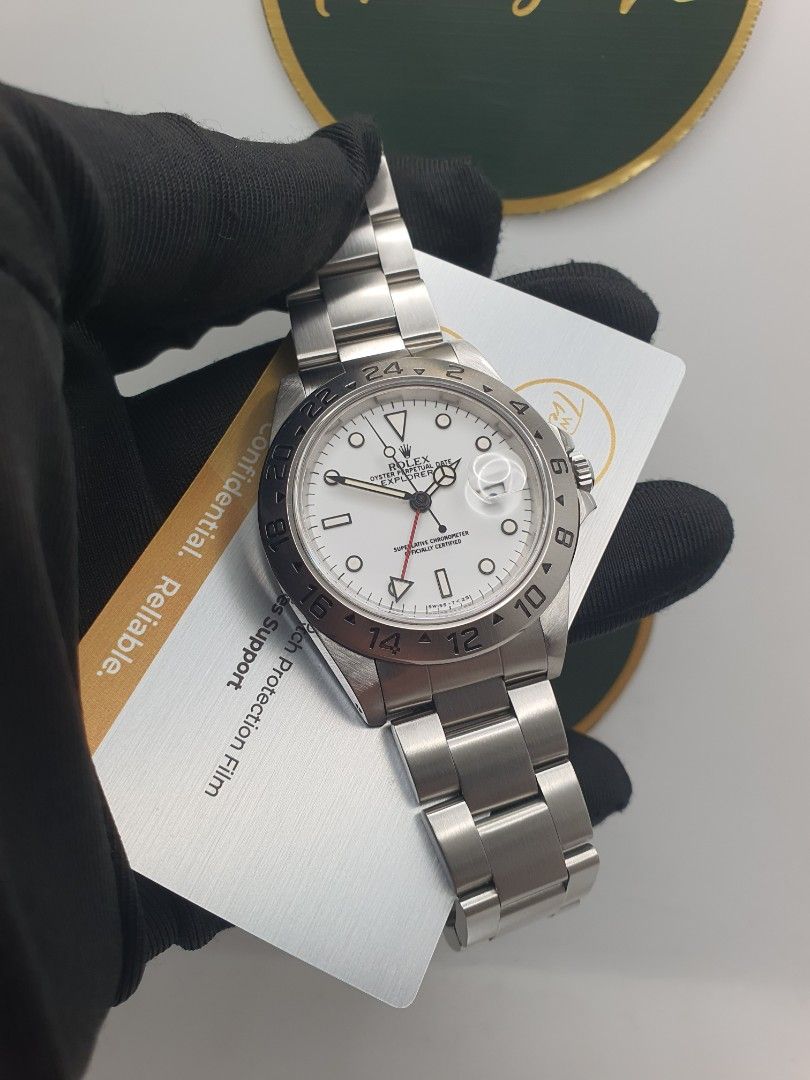 💥🤍Tritium rolex 16570 explorer ii white polar 40mm patina pumpkin🗯🤍not *226570 216570 16550* (Category: Watches) located in Singapore. Submitted by wearabletreasure (Listing ID 1465452548, Image 1). Description: Rating:Near Mint Remarks:very nice case shape. very nice tritium hand and dial that has developed a very light yellow custard patina formation. very even and nice patina. serviced back in 2024 Package: rolex 16570 explorer ii white no