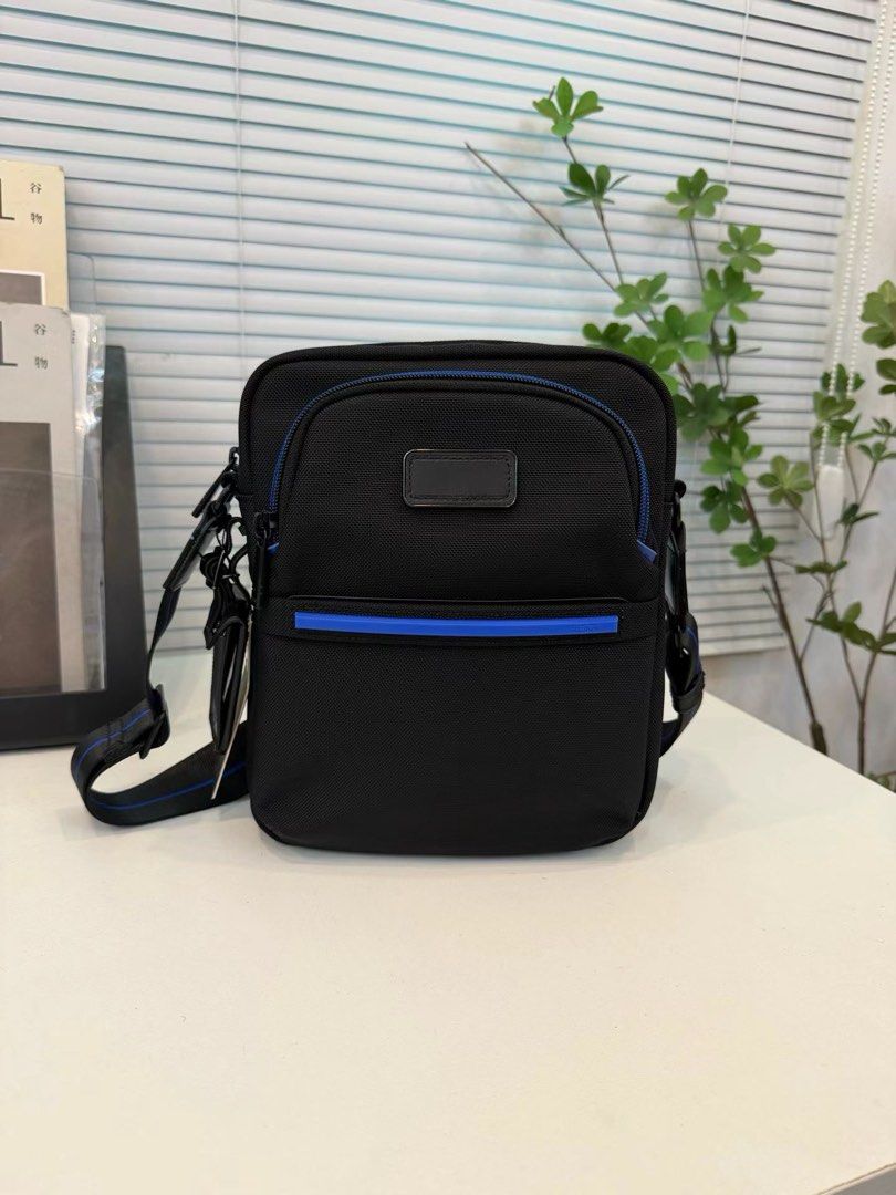 Tumi Alpha 4 Medium Crossbody (Category: Sling Bags) located in Manila. Submitted by bagmaniaph (Listing ID 1465535401, Image 1). Description: This shoulder bag features a slim square form and a vibrant line accent at the opening. Its exquisite size allows for neat storage of everyday small items, making daily travel look smart. The internal pockets and front zip design enable smooth organization and retrieval of valuables. The adjustable shoulde